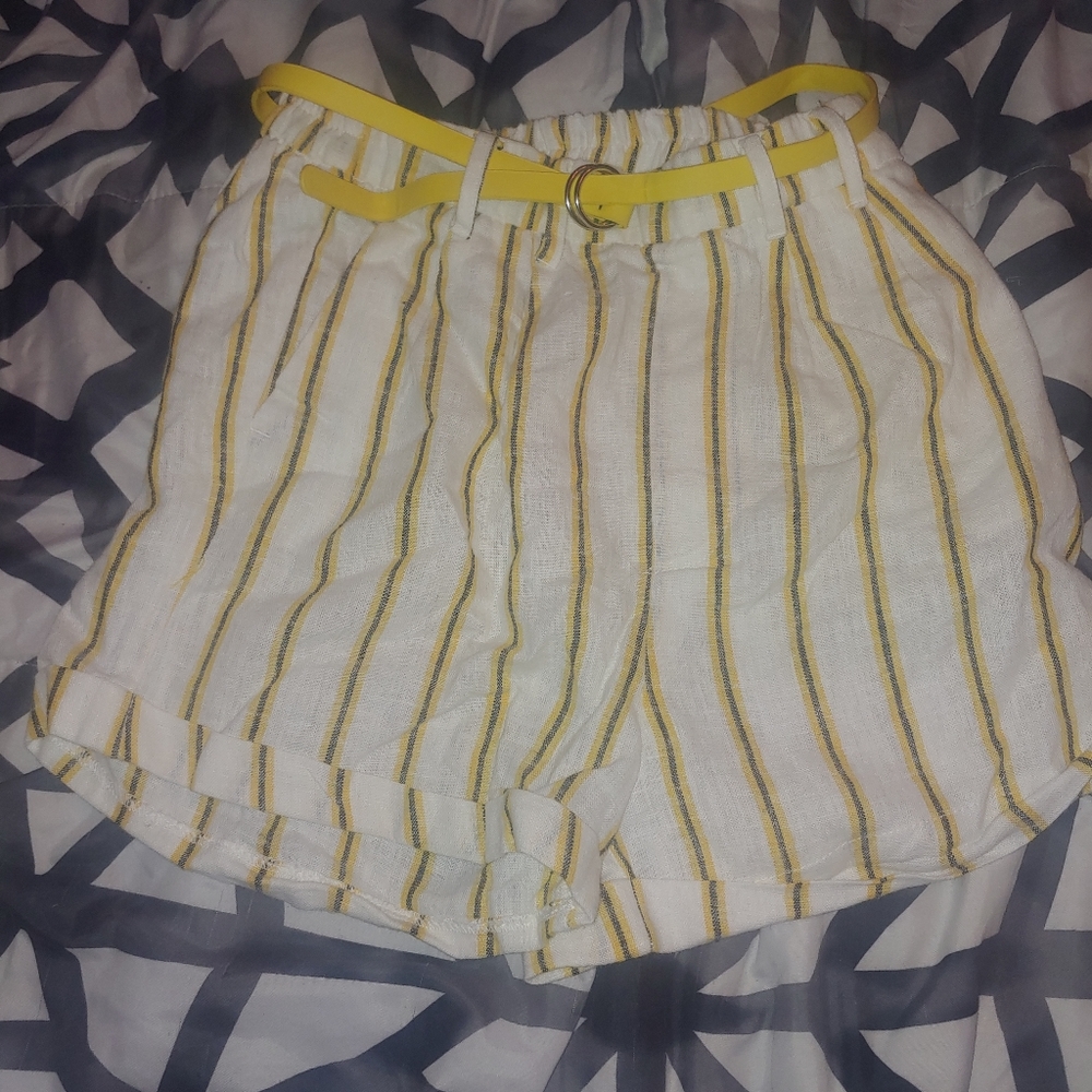 White shorts with black and yellow stripes